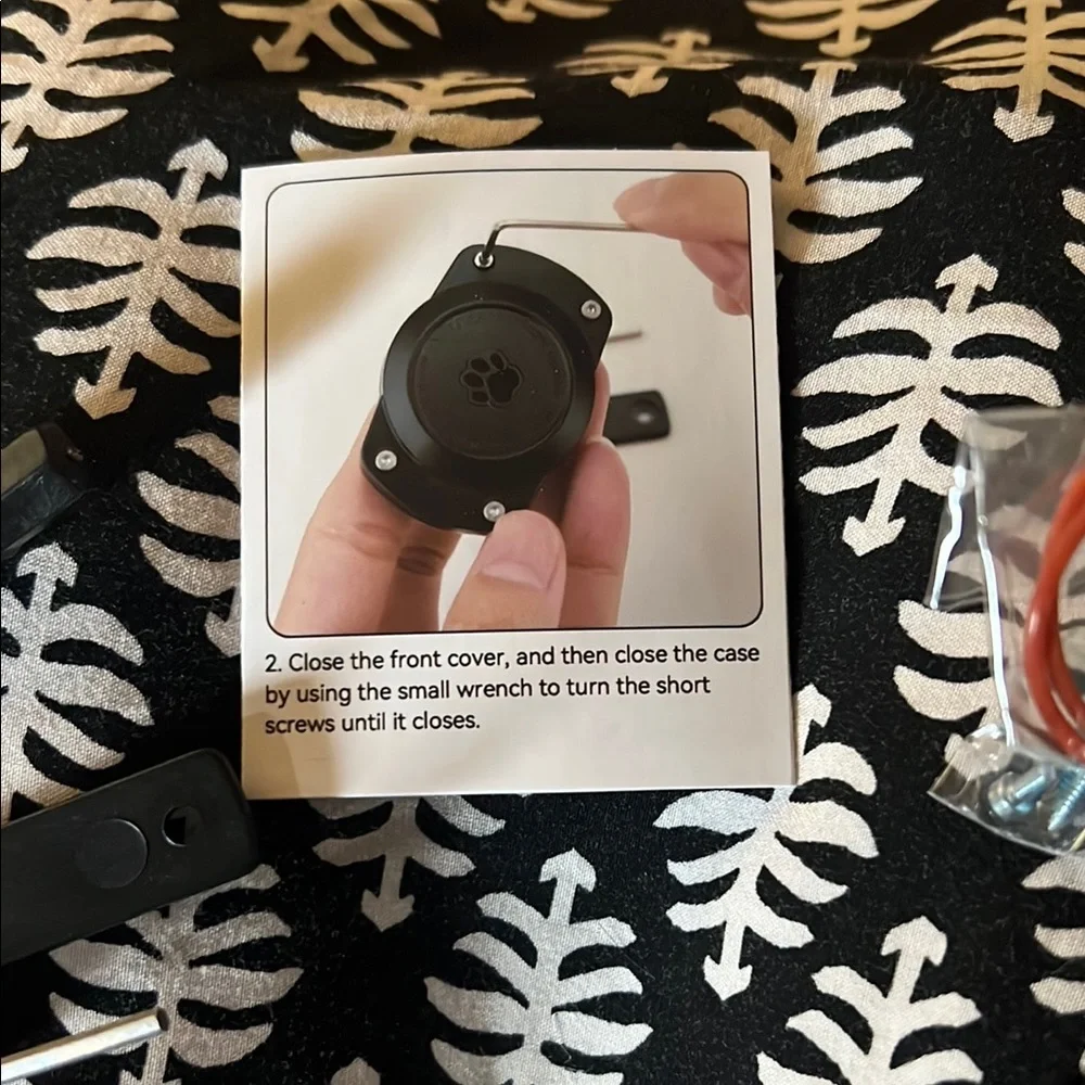 Black Airtag Holder with Accessories